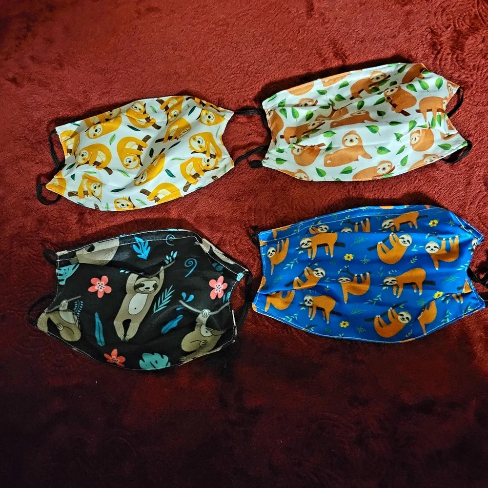 NWT YELLOW SLOTH ADULT FACE MASK 4 PACK UNISEX SIZE ONE SIZE FITS ALL