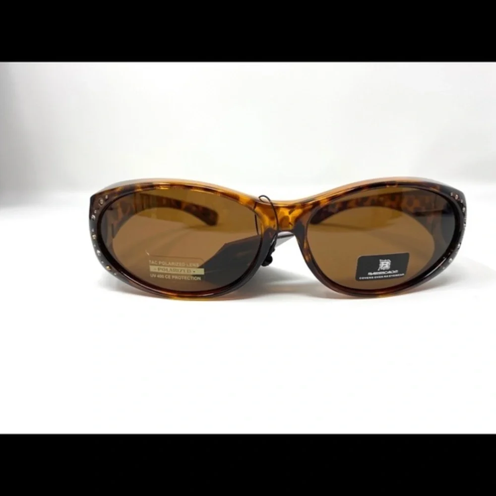 Cover over sunglasses for rx eyewear.