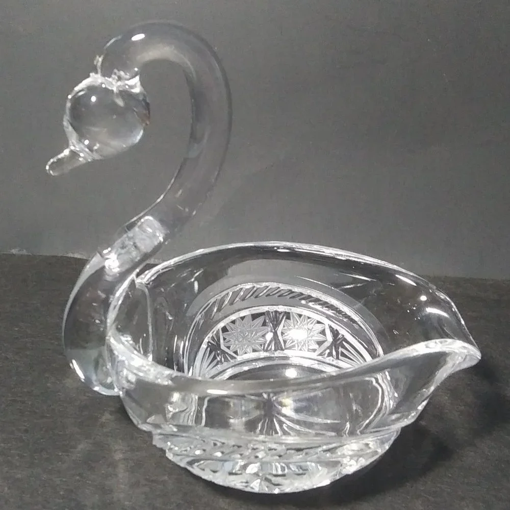 lovely clear glass swan shaped trinket dish with cut design on sides