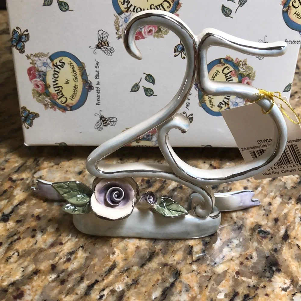 Blue Sky Clayworks 25th Anniversary Cake Topper by Heather Goldminc