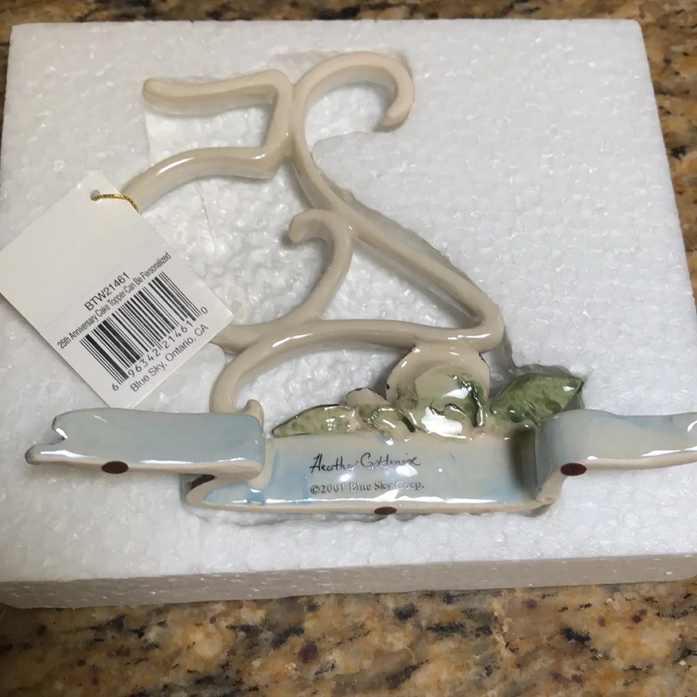 Blue Sky Clayworks 25th Anniversary Cake Topper by Heather Goldminc