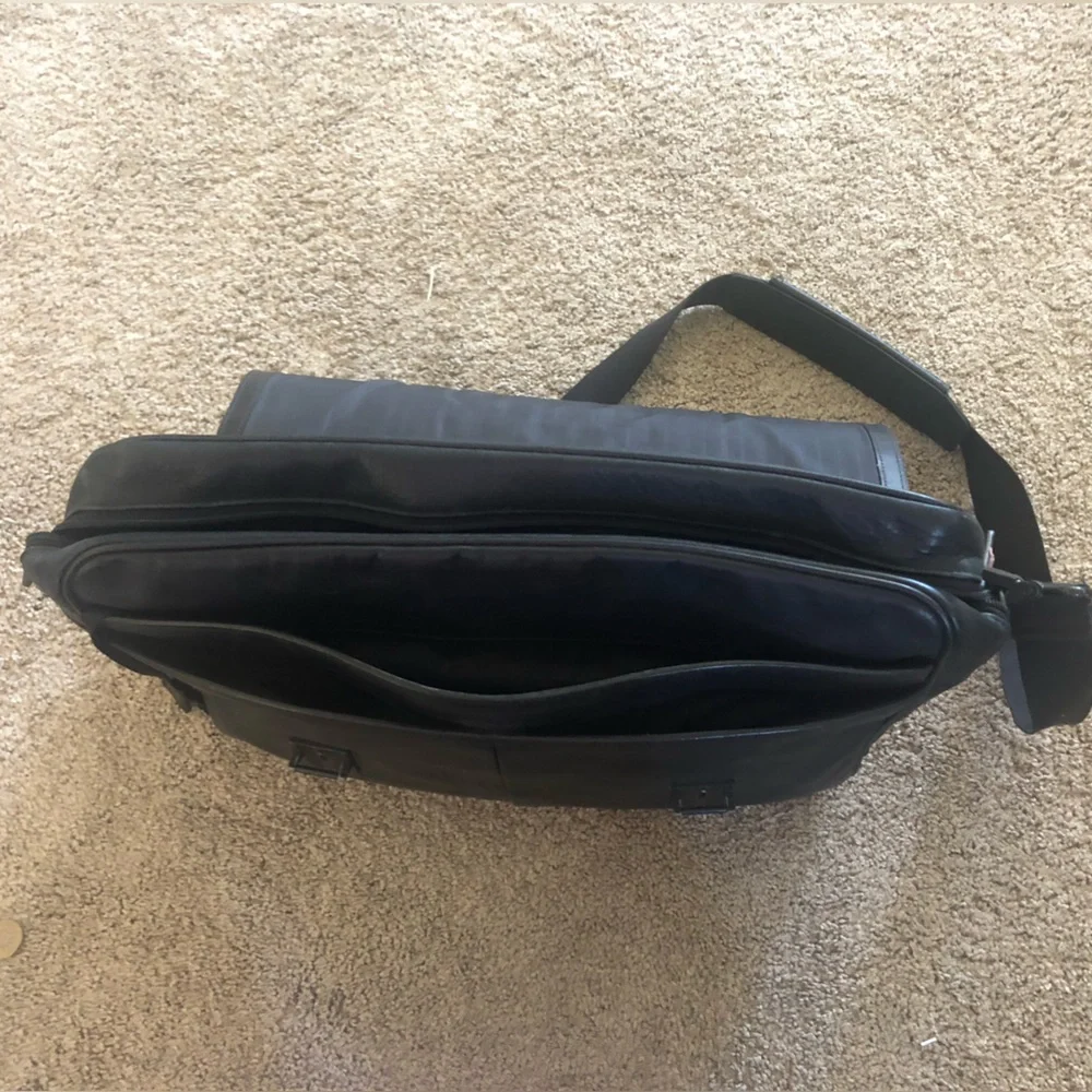 Tumi black leather