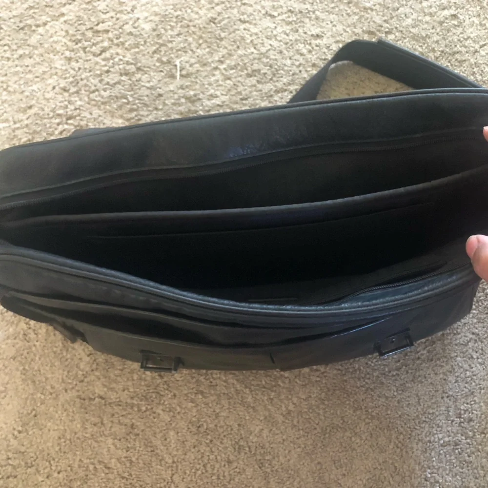 Tumi black leather