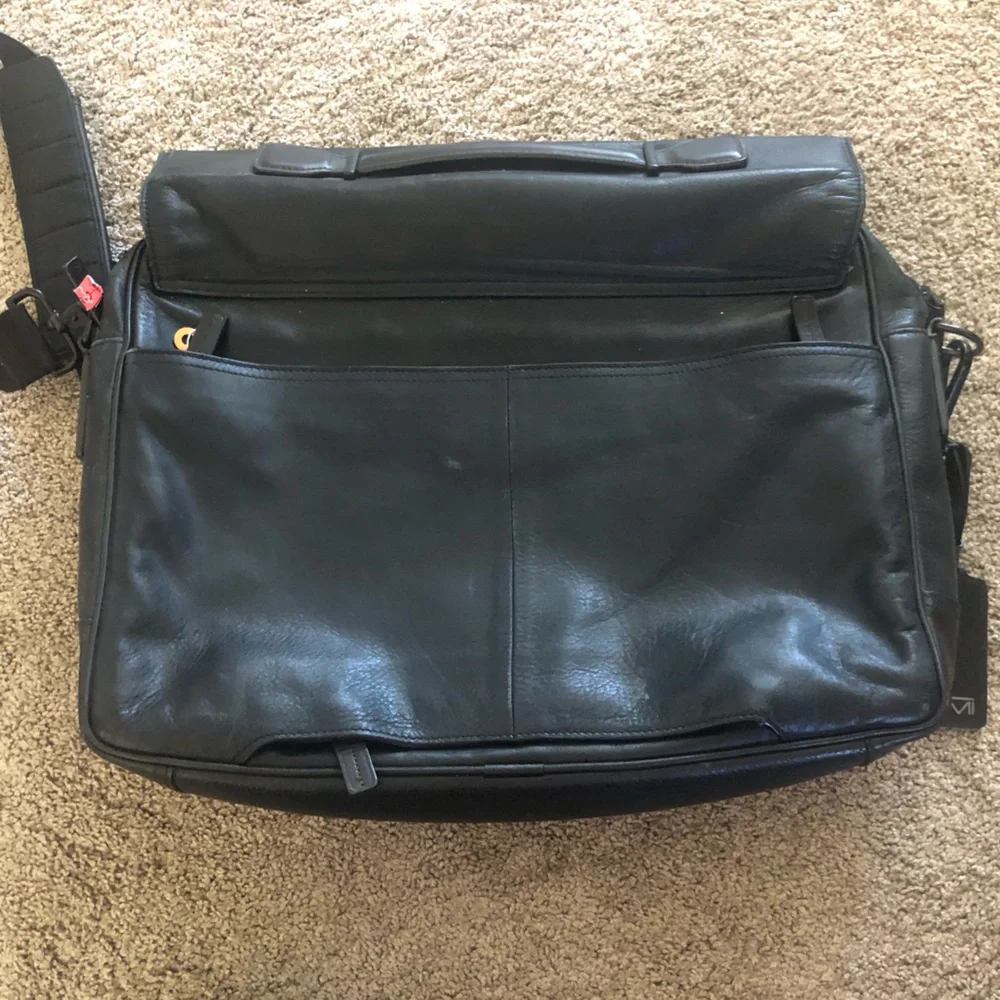 Tumi black leather