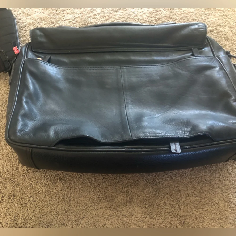 Tumi black leather