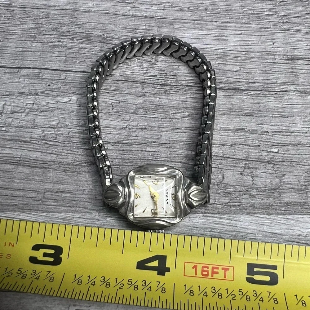 Croton silver tone