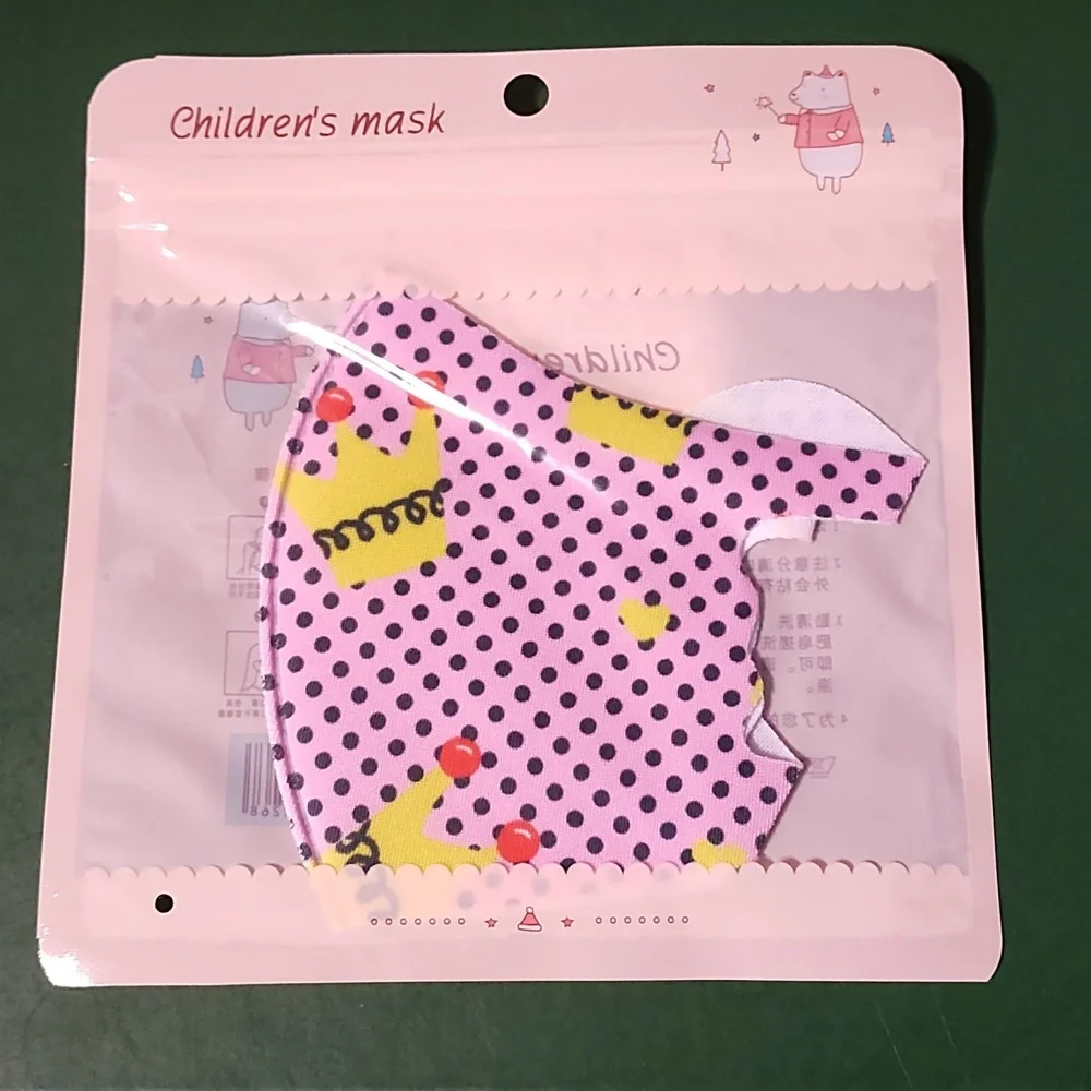 Children's re Usable face mask new in package never opened