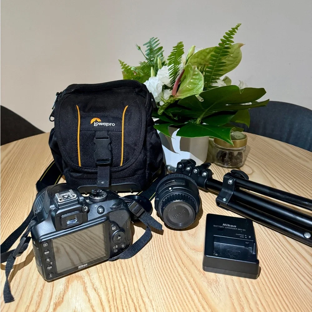 Nikon D3400 DSLR like new with 2 different lenses-batteries-bag and camera stand