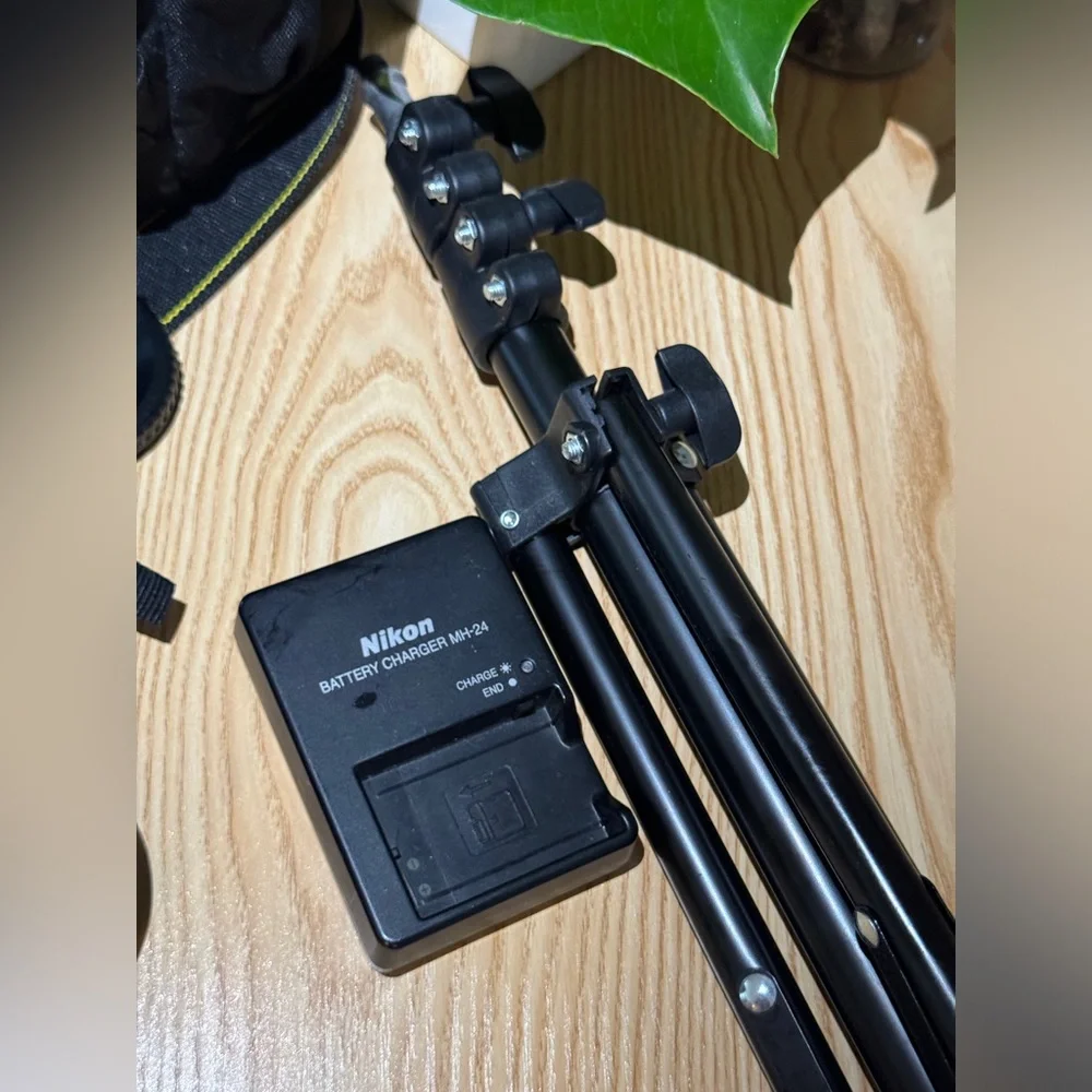 Nikon D3400 DSLR like new with 2 different lenses-batteries-bag and camera stand