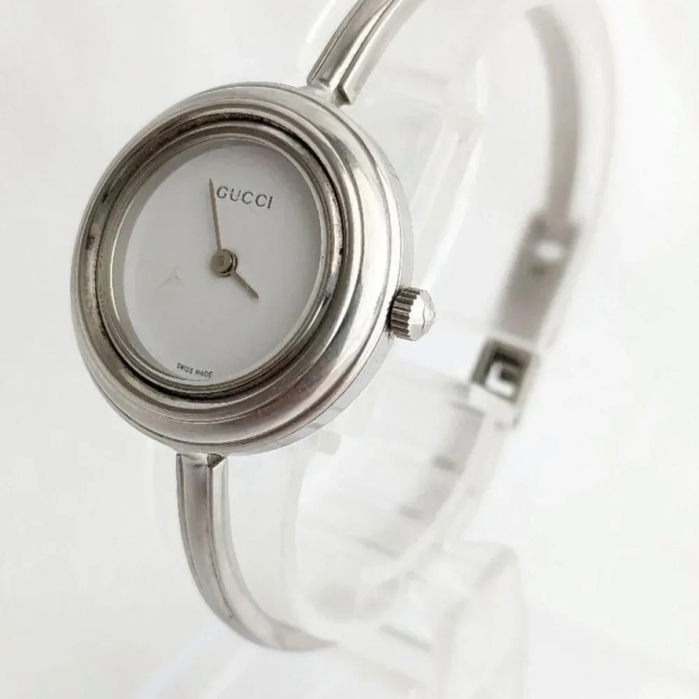 GUCCI Silver Italian Luxury Bracelet Watch with Bezels for changing