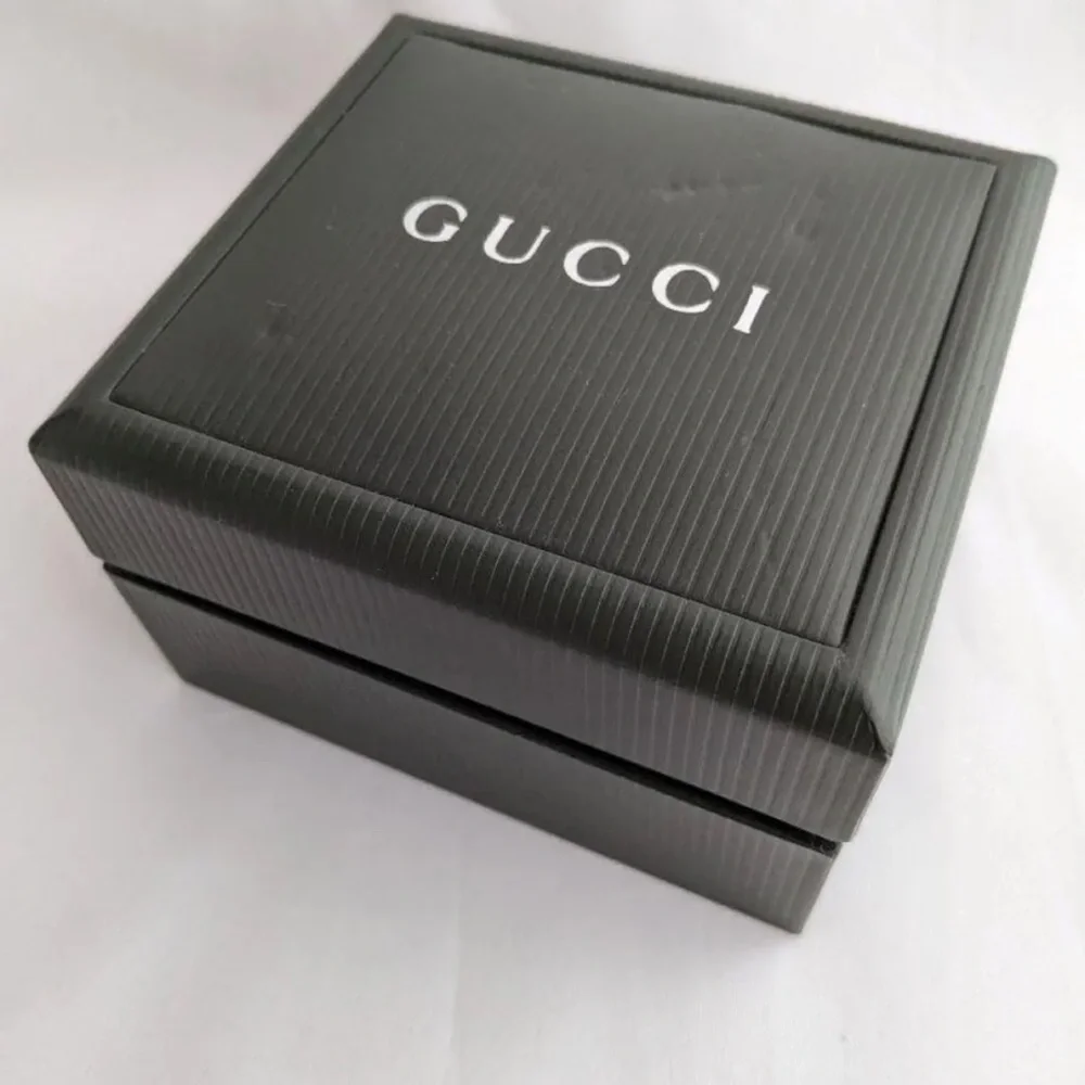 GUCCI Silver Italian Luxury Bracelet Watch with Bezels for changing