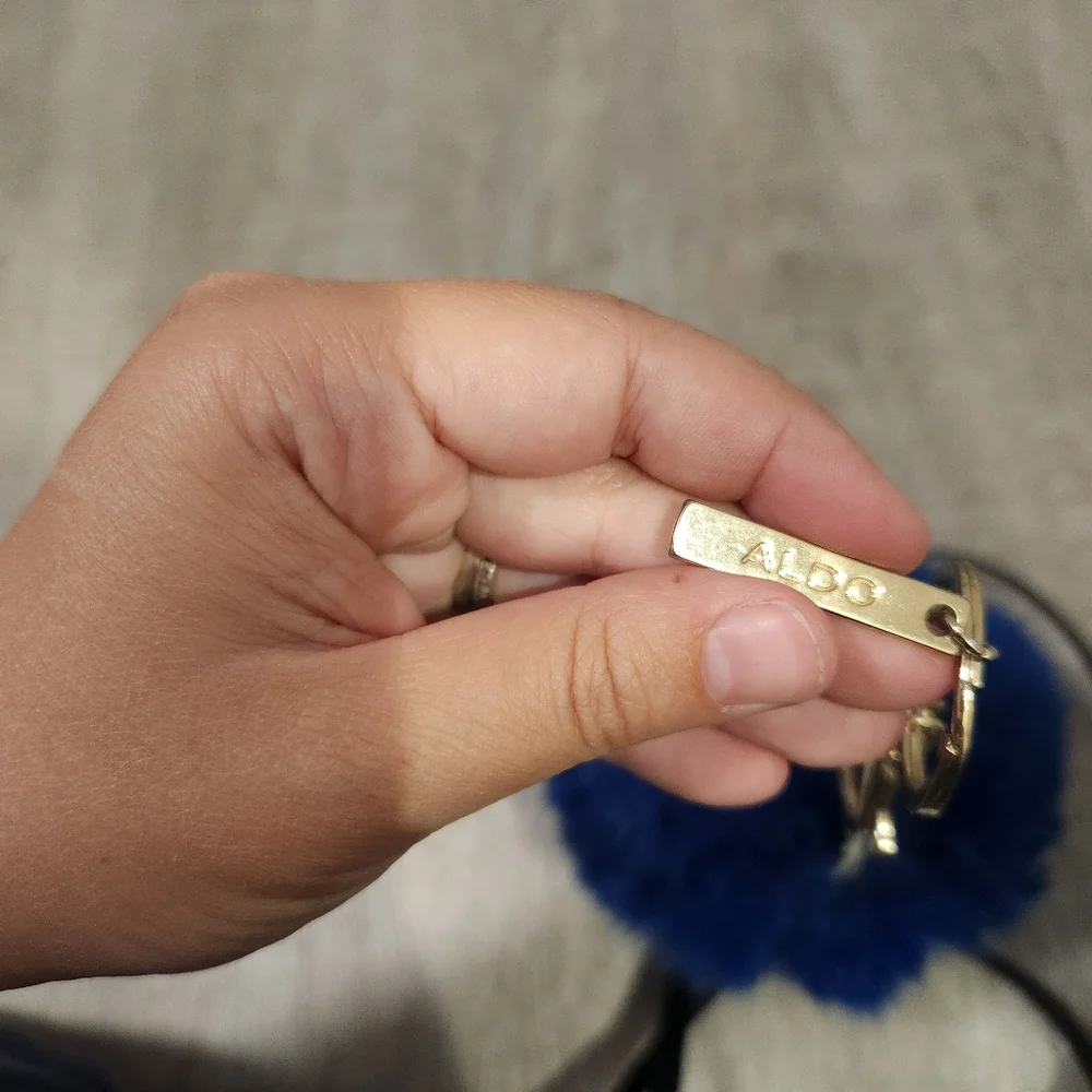 Aldo pom keychain