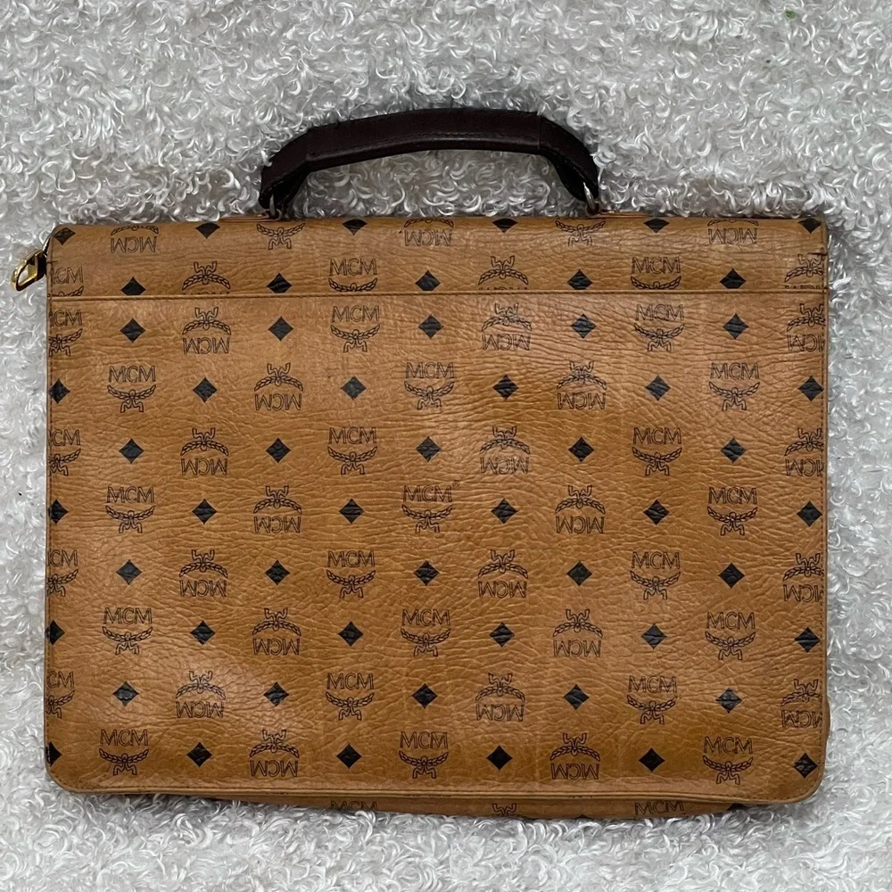 MCM distressed bag signs