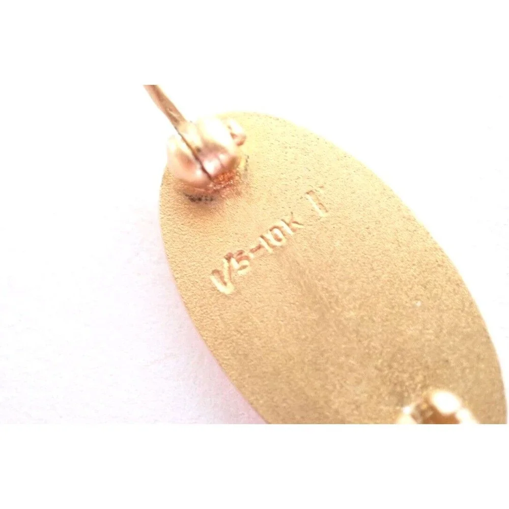 Unbranded gold cross