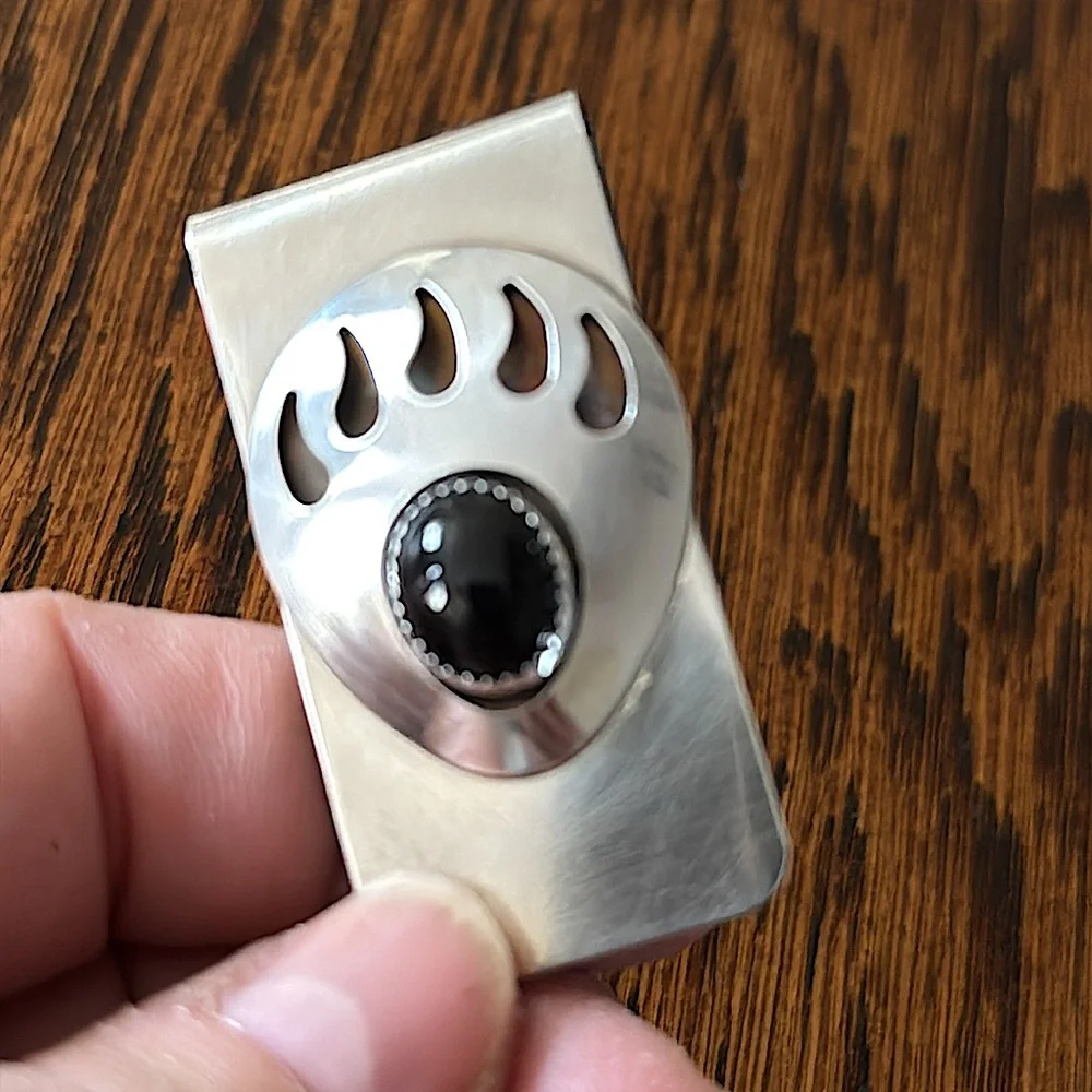 Vintage Silver and onyx shadow box bear paw money clip. Clip is 2” x 1”.