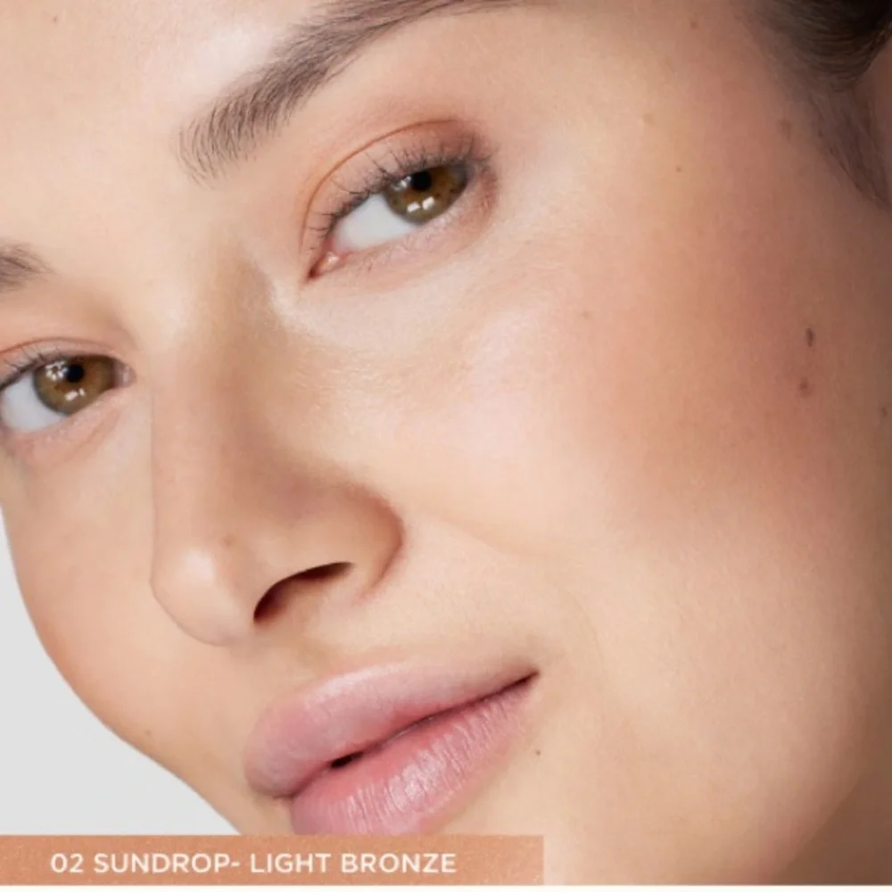 laura mercier details first
