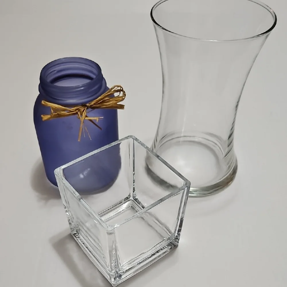 Bundle of Clear Glass and Blue Vases