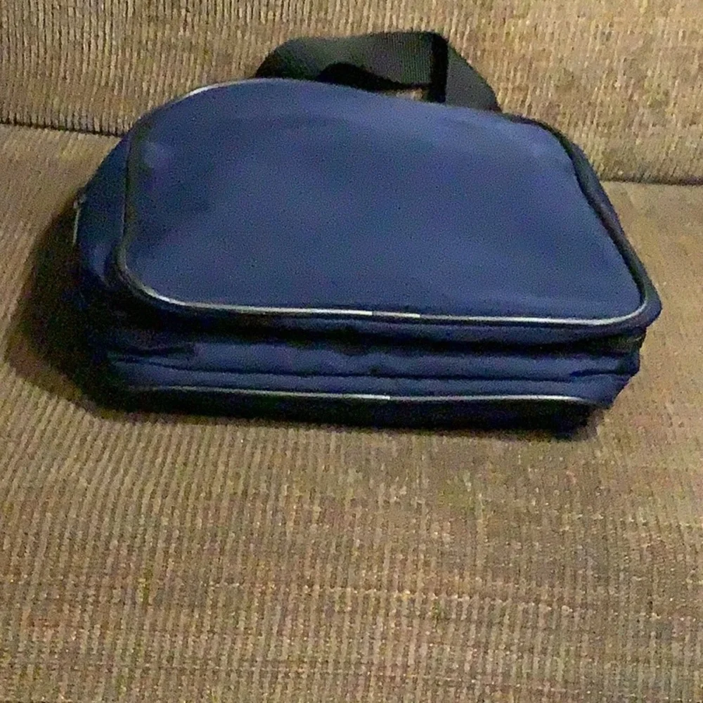American Tourister Navy collapsible duffle bag