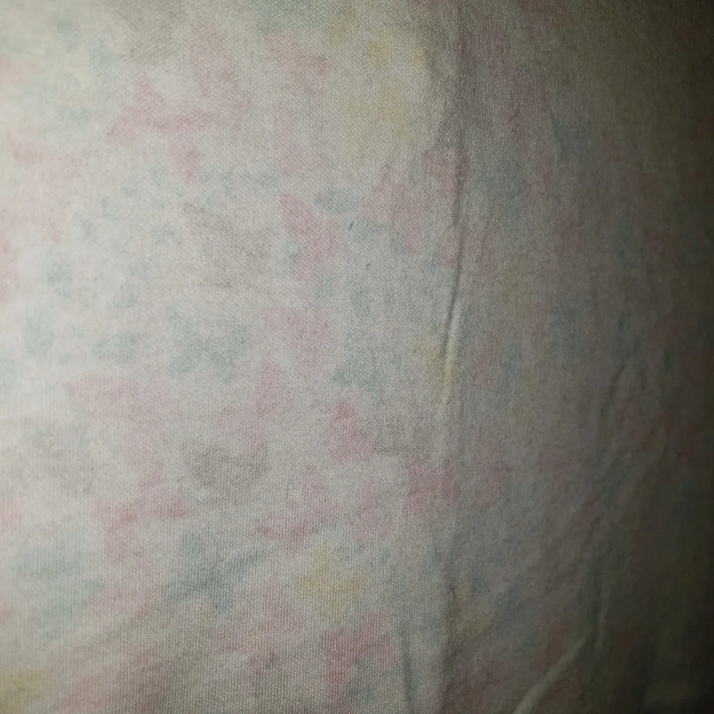Patchwork Quilt with Pink and Yellow Accents