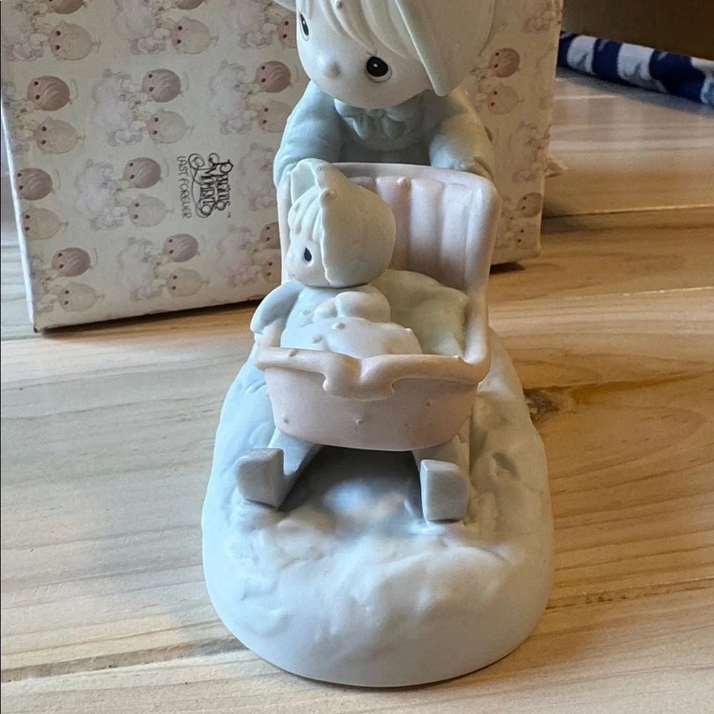 Precious Moments referral precious figurine