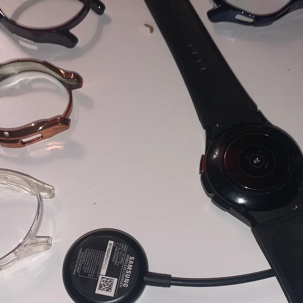 Samsung Black Smartwatch with Multiple Bands