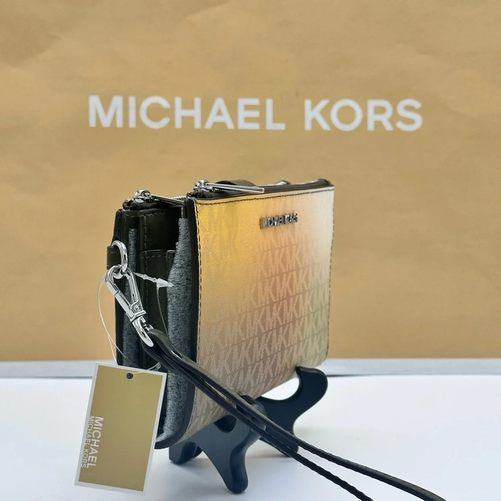 Michael Kors wristlet logo