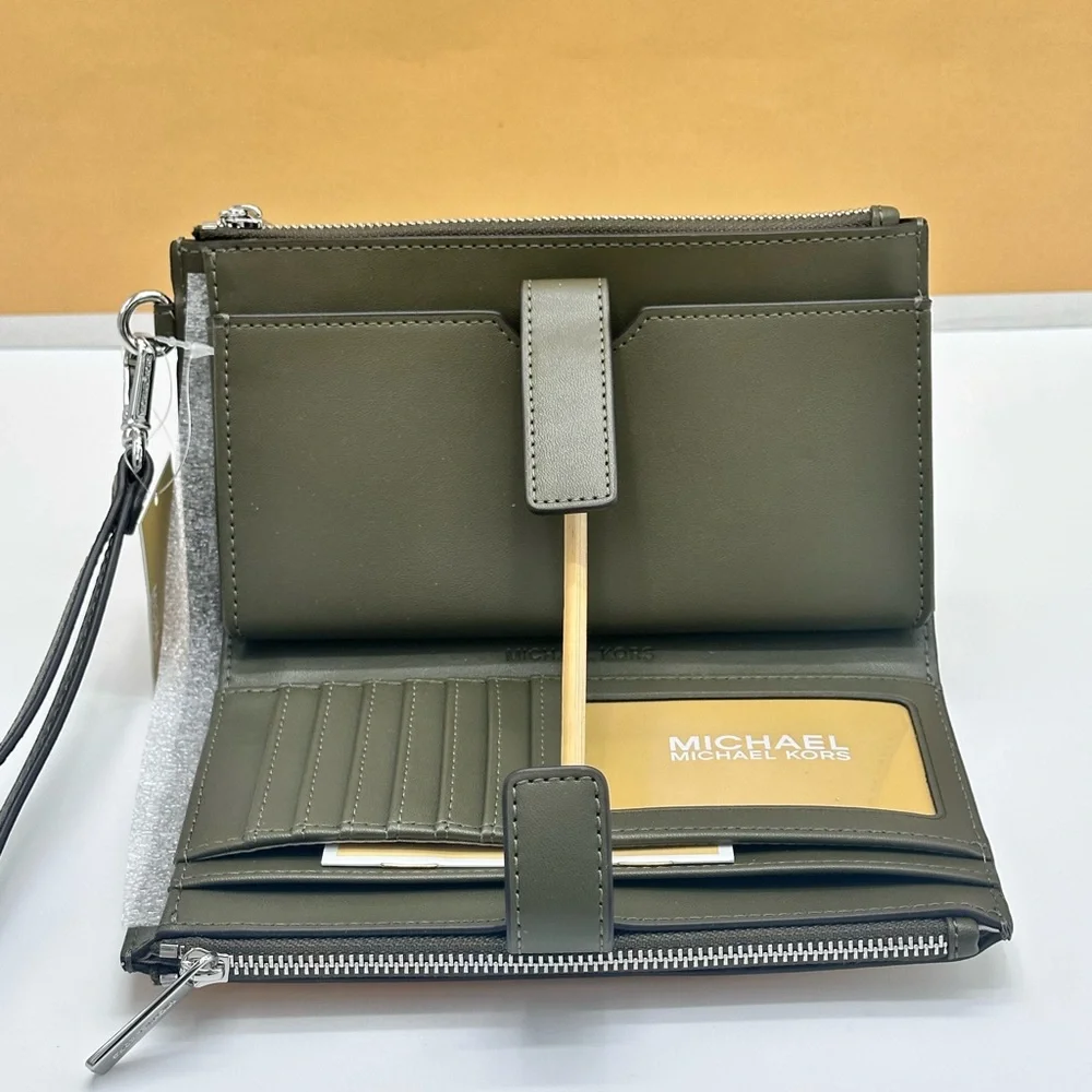 Michael Kors wristlet logo