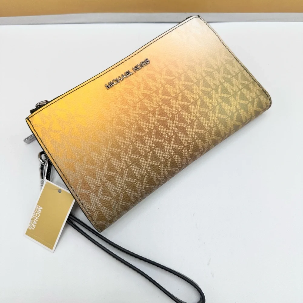 Michael Kors wristlet logo