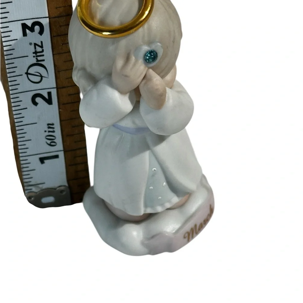 Precious Moments March Angel Figurine - White and Cream