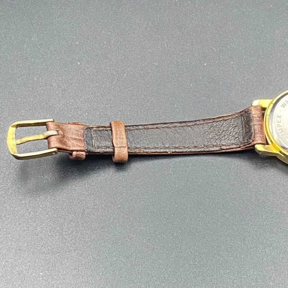 Quartex gold tone