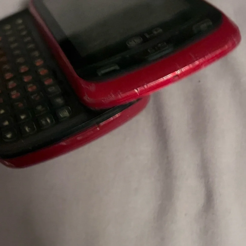 LG Red and Black Slide-Out Phone