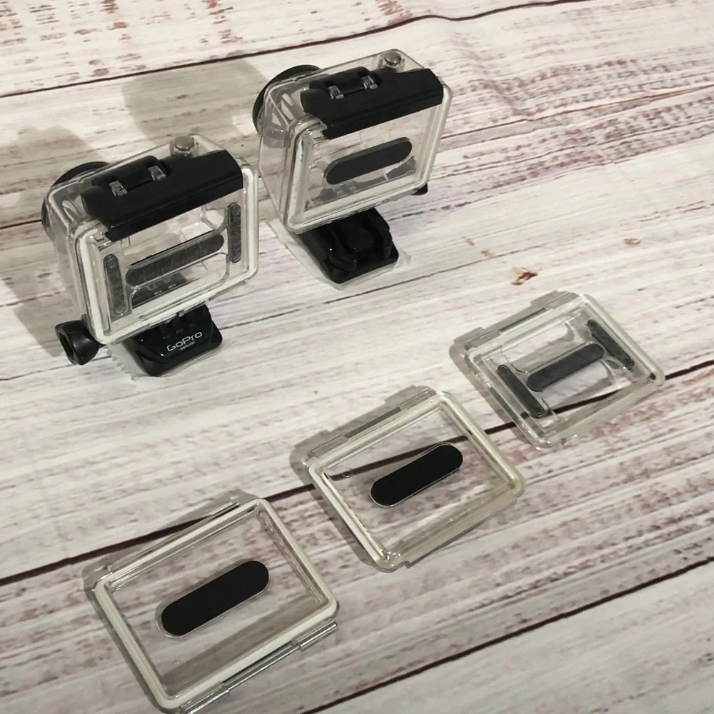 Used GO PRO Hero Cameras for parts with Waterproof Cases no battery