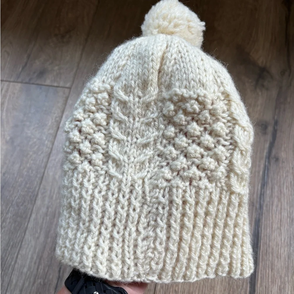 Hand knit both 8” off