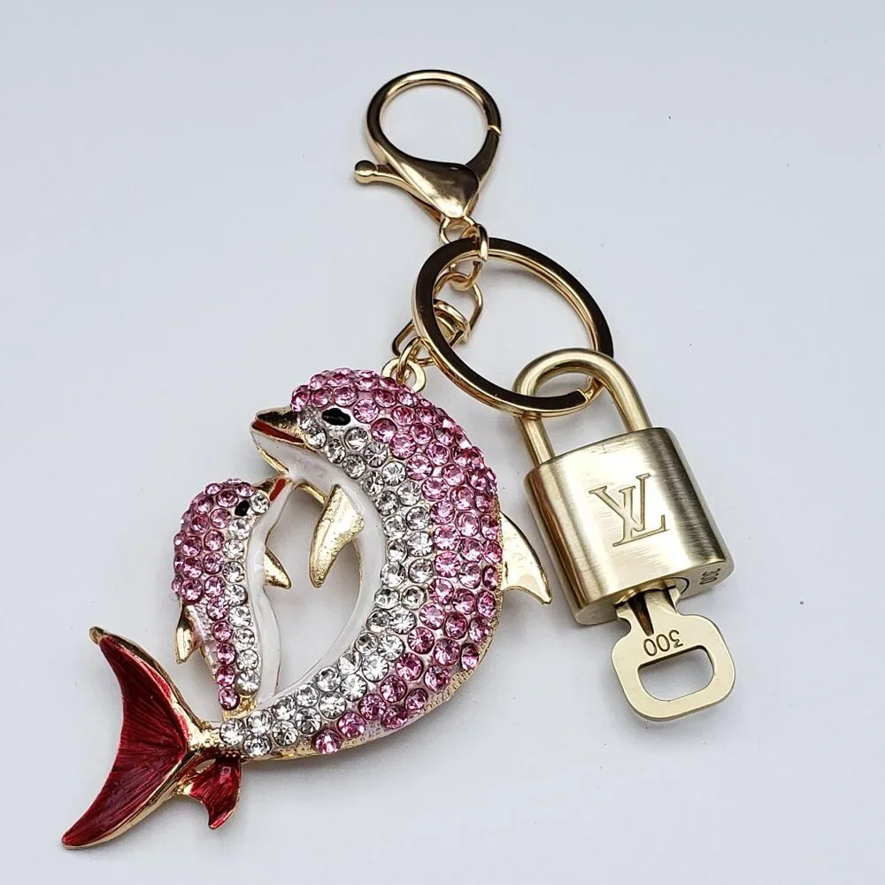 Authentic Louis Vuitton Gold Lock 🔒 Unbranded Dolphine Keychain Bag Charm LV