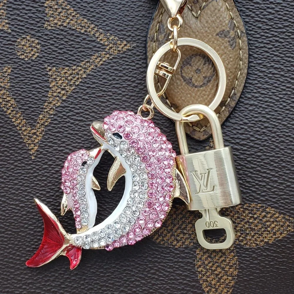 Authentic Louis Vuitton Gold Lock 🔒 Unbranded Dolphine Keychain Bag Charm LV