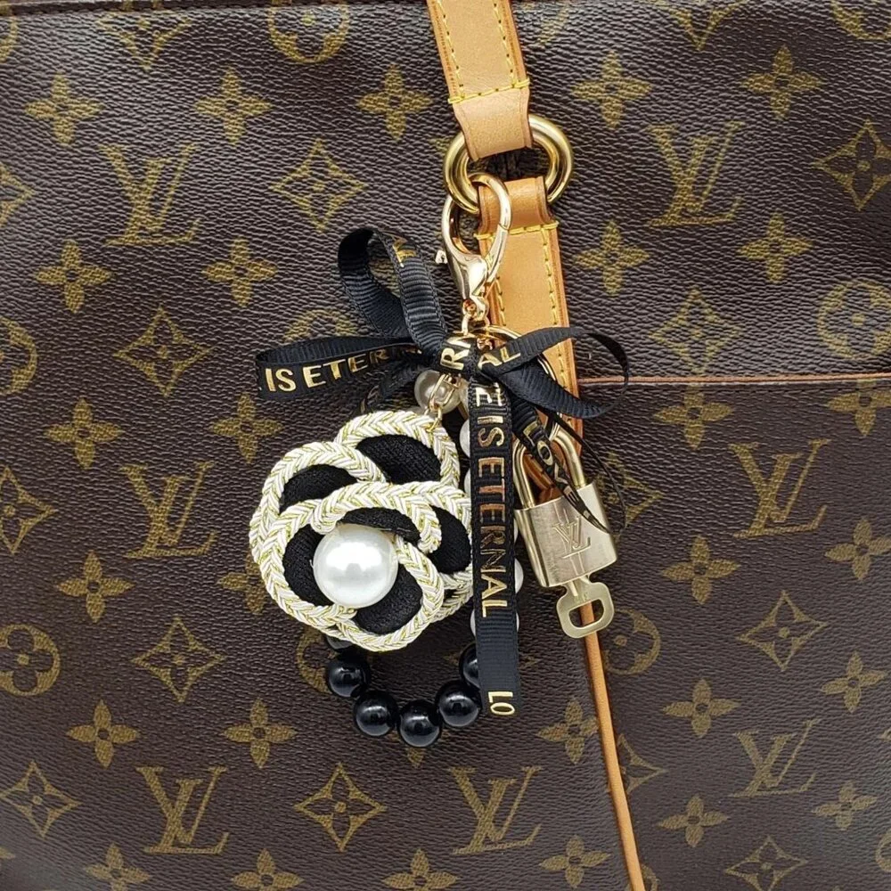 Authentic Louis Vuitton Lock & Key with unbranded flower Bagcharm, Keycharm