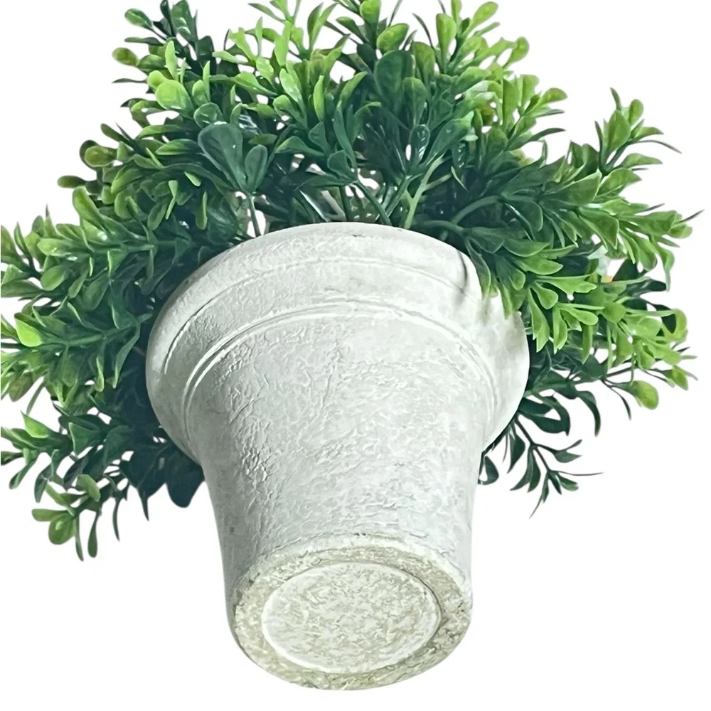Elegant White Planter with Lush Greenery