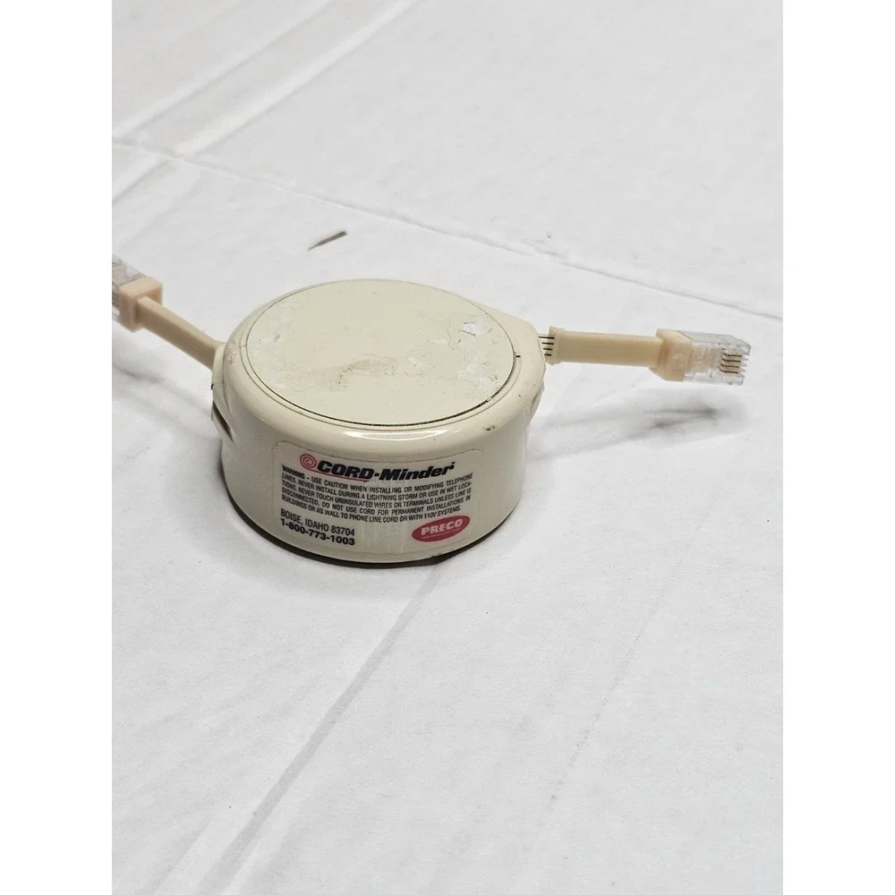 Vintage CORD-Minder Telephone Line Cord Retractor by Presco Beige