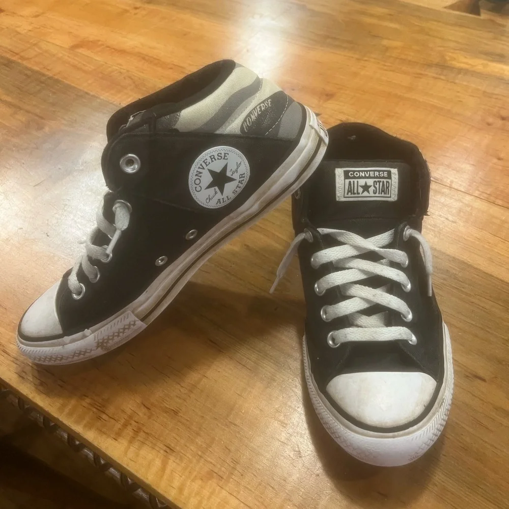 Converse Black and White High-Top Sneakers with Iconic Design
