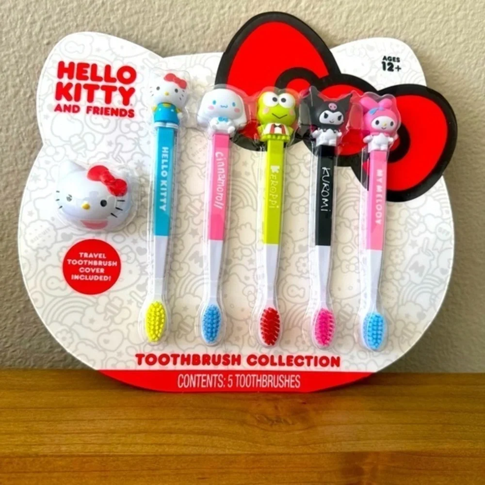 Hello Kitty and Friends toothbrush collection with bonus travel cover ages 12+