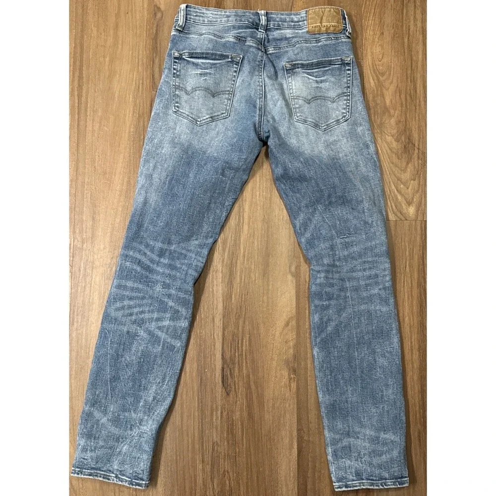American Eagle Outfitters Next Level Flex Distressed Lght Denim 29x32 Jeans VGUC