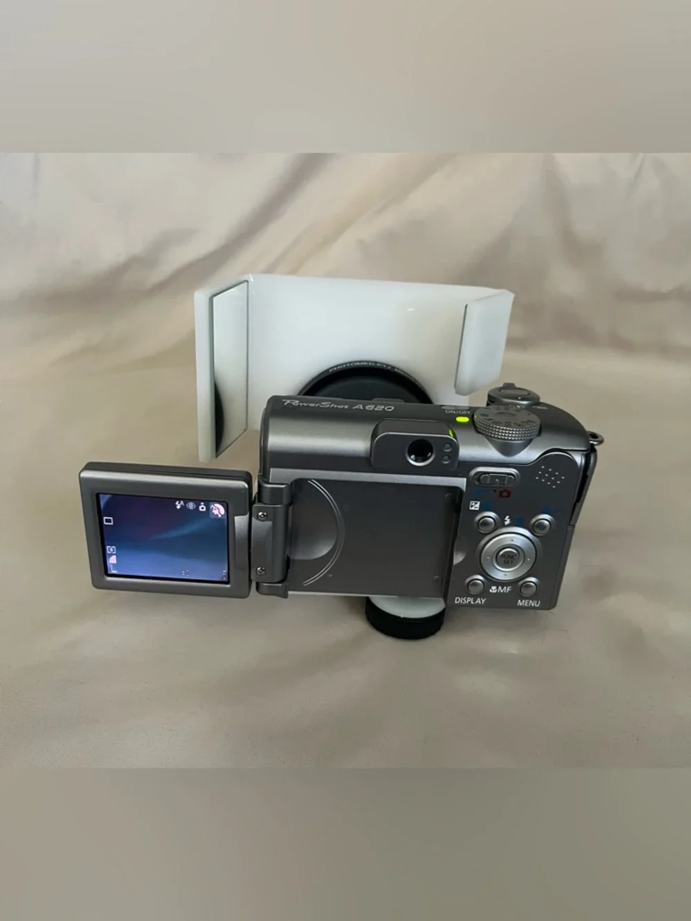 Canon PowerShot A620 digital camera with Photomed dental photography attachment