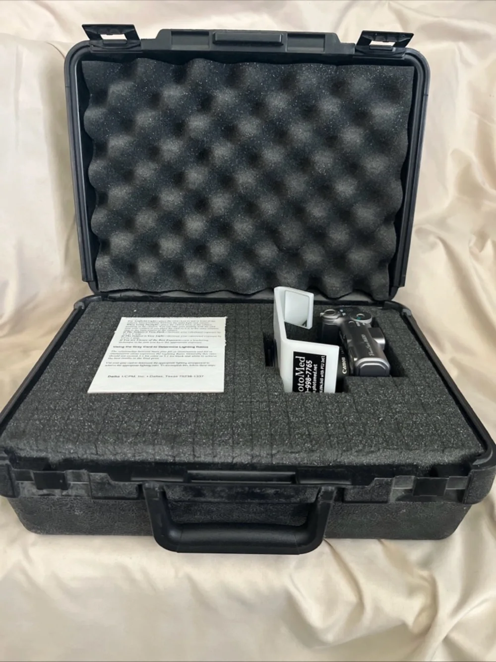 Canon PowerShot A620 digital camera with Photomed dental photography attachment