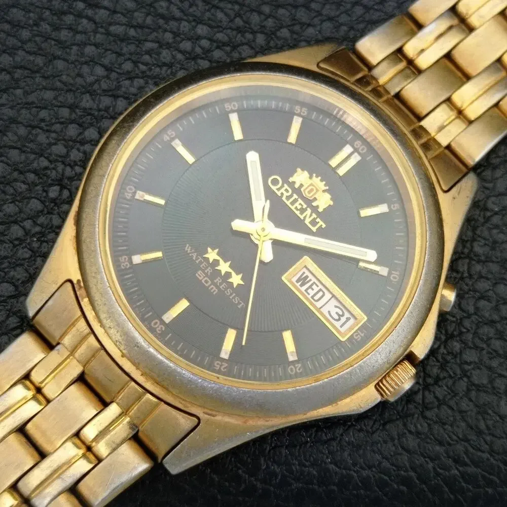 Vintage 1972 Orient Automatic Mens Gold Watch W/daydate & Black accents