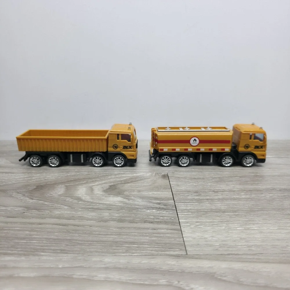 DLX Builder equipment/trucks lot - 2 Hauling Trucks