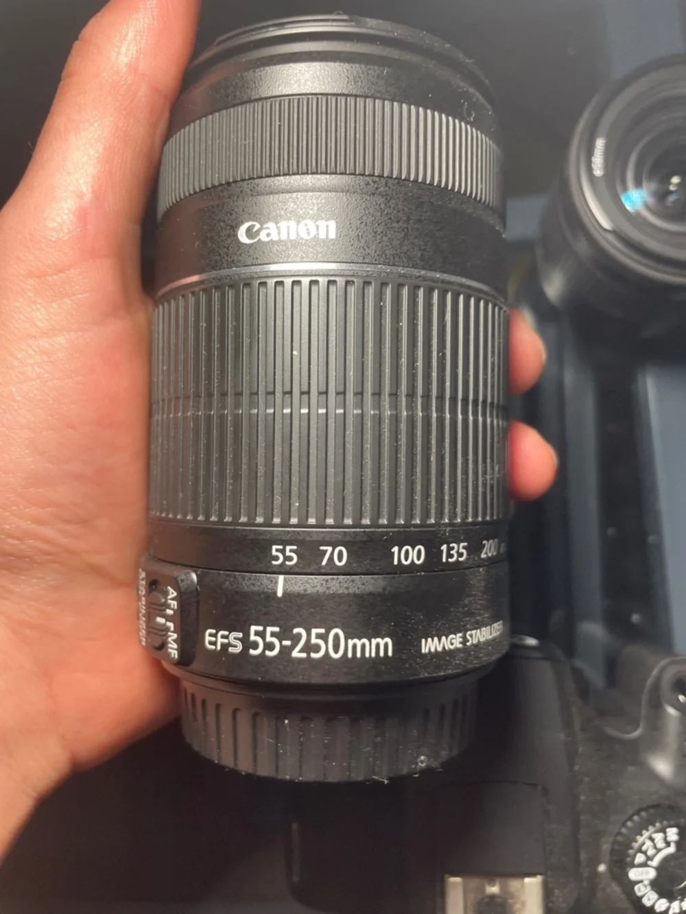 Canon EOS 4000d with 55-250 mm macro lens and 18-55 mm lens with battery