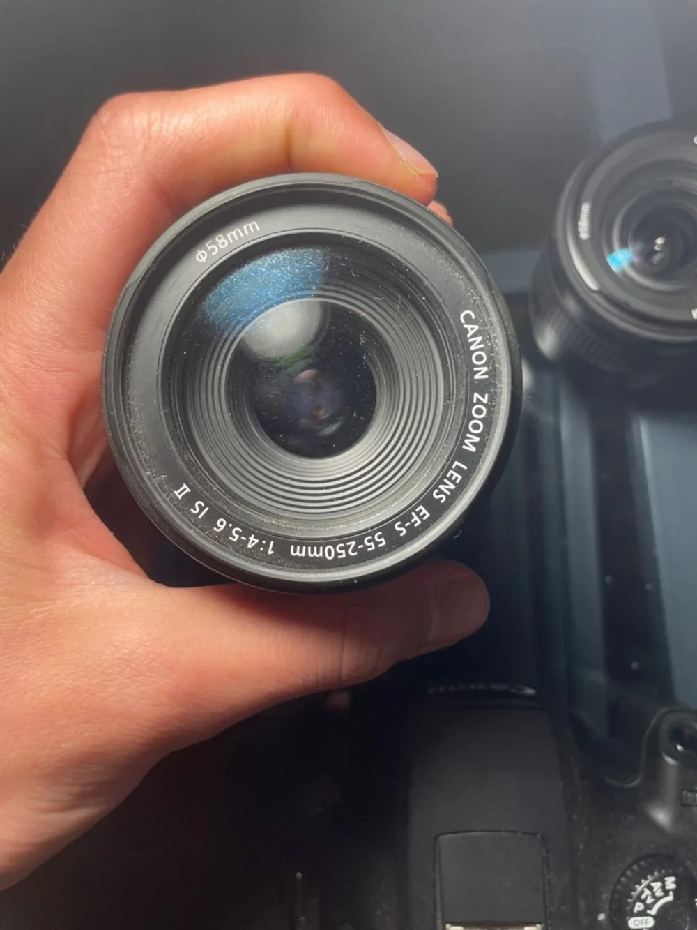 Canon EOS 4000d with 55-250 mm macro lens and 18-55 mm lens with battery