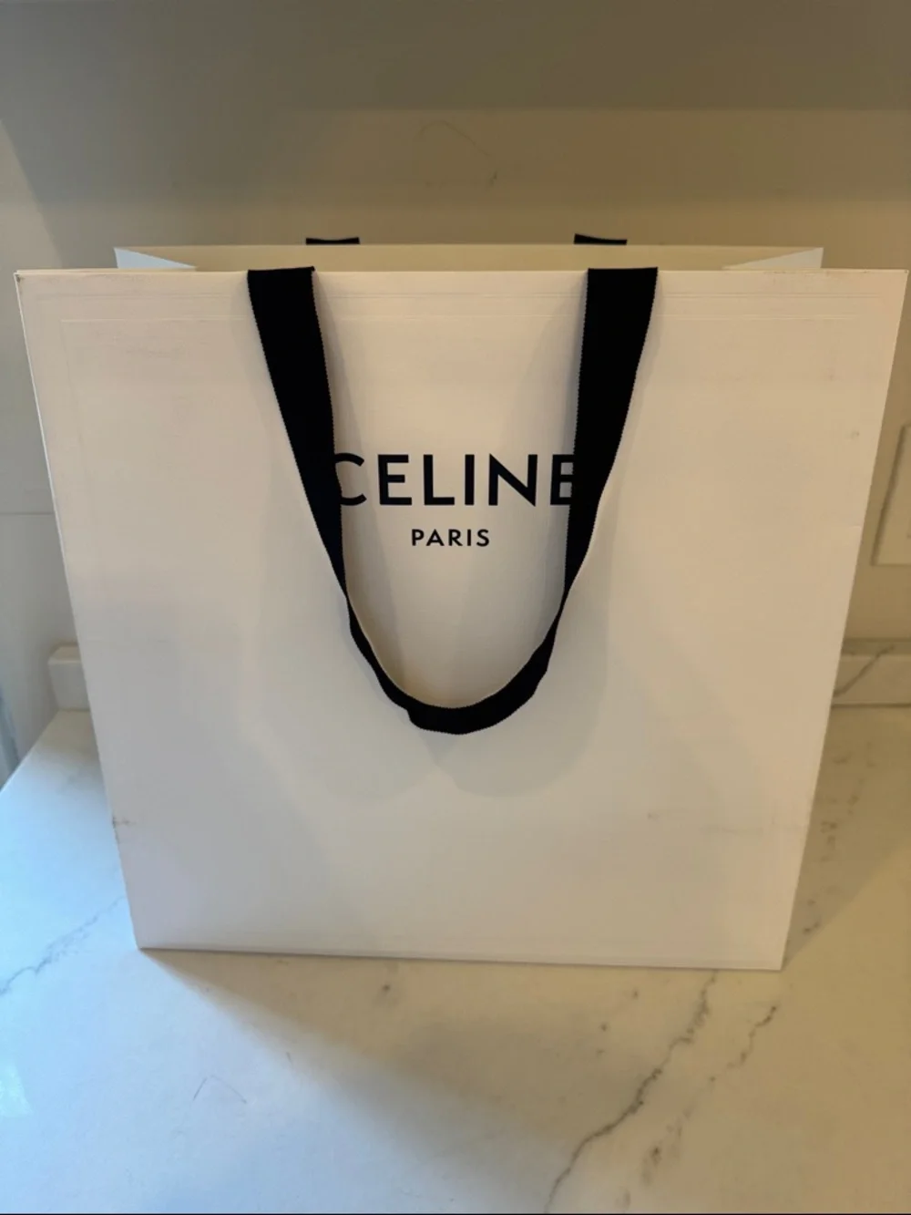 Celine upscale ribbon photos