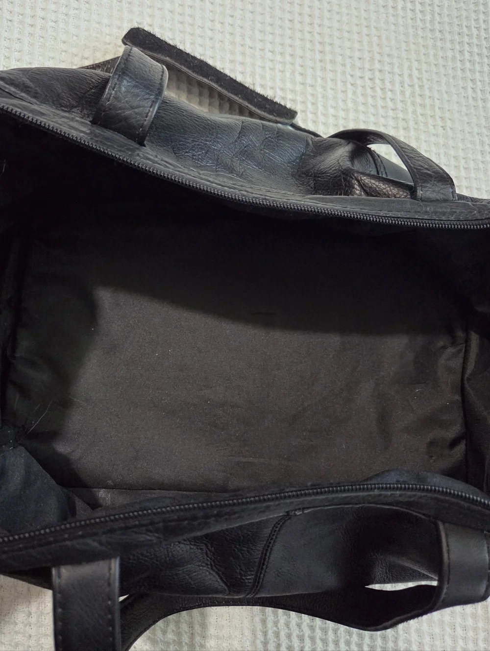 N/A black duffle