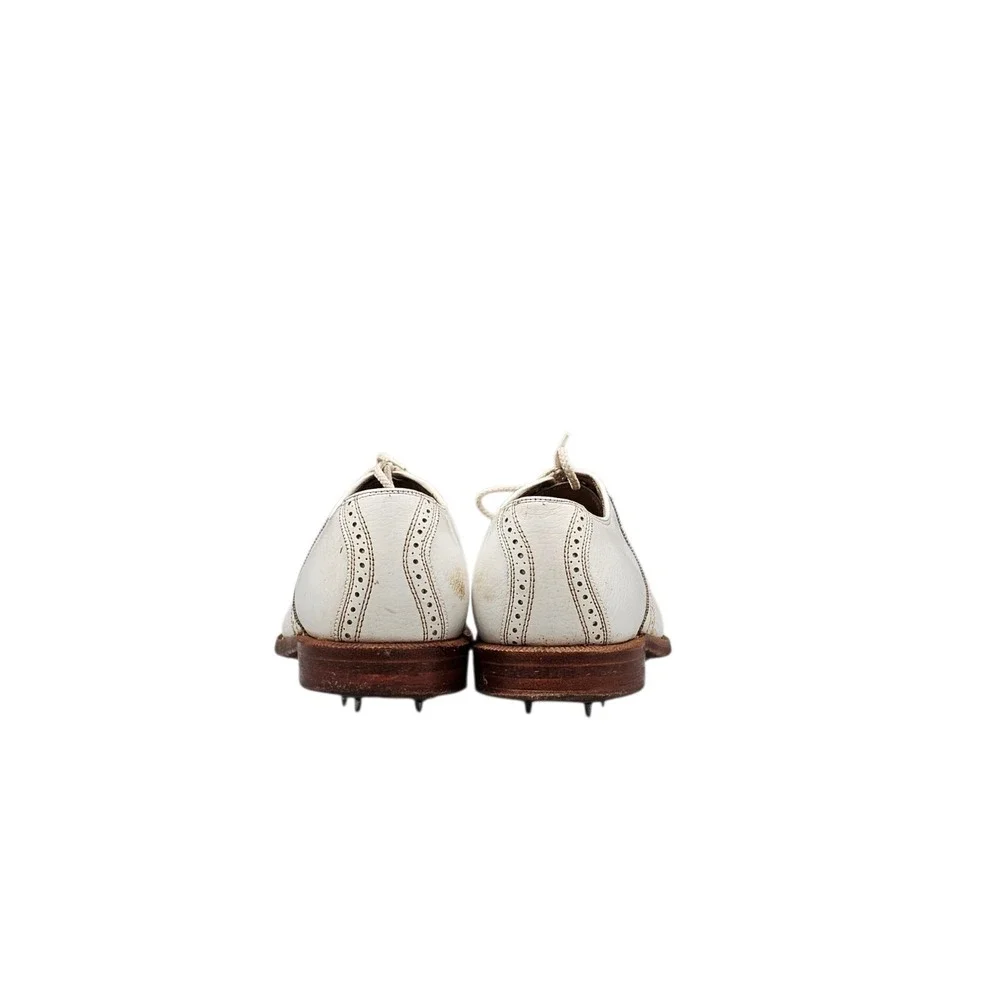 Johnston & Murphy metal cleats